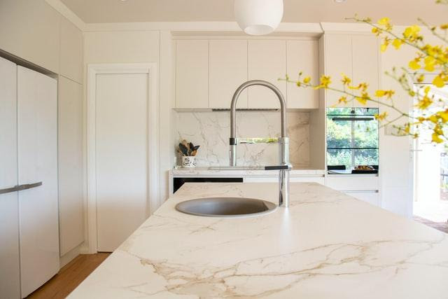 A marble countertop with a white sink
